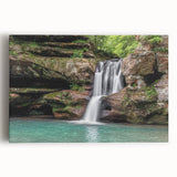 Stretched canvas wall art depicting a vibrant waterfall landscape with lush greenery, ideal for home decor, creating a serene atmosphere and enhancing interior aesthetics.