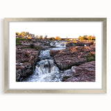 Framed wall art collection featuring a serene landscape with waterfalls, presented in a silver frame with matting, ideal for enhancing home decor.