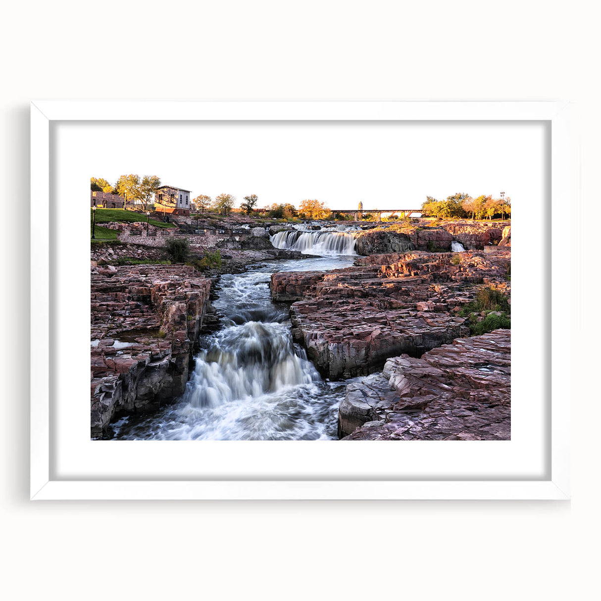 Framed wall art collection showcasing a serene landscape waterfall design in a white mat, enhancing modern decor aesthetics, ideal for nature lovers.