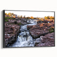 Framed canvas wall art showcasing a breathtaking waterfall landscape design, featuring vibrant blues and greens, with a sleek black frame and side view perspective. Ideal for nature enthusiasts and home decor lovers, this piece adds a serene touch to any interior space.