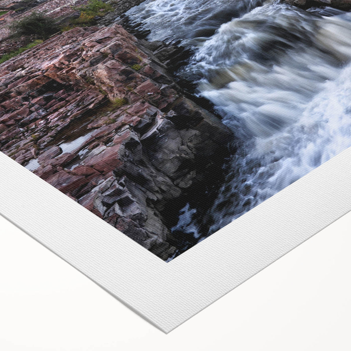 Vibrant rolled canvas showcasing a stunning waterfall landscape design, perfect for home decor, featuring rich colors and intricate details, elegantly packaged for display.