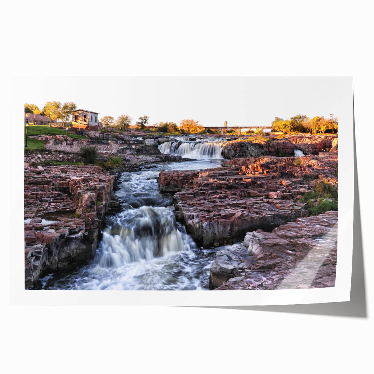 Collection of three vibrant landscape waterfall art prints, showcasing cascading waterfalls in lush green settings, perfect for home decor. The prints are rolled and ready for framing, emphasizing the beauty of nature.