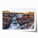 Collection of three vibrant landscape waterfall art prints, showcasing cascading waterfalls in lush green settings, perfect for home decor. The prints are rolled and ready for framing, emphasizing the beauty of nature.