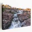 Stretched canvas wall art showcasing a serene waterfall landscape design, emphasizing vibrant blues and greens, ideal for home decor and relaxation.