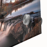 Close-up of a vibrant acrylic wall art piece showcasing a serene waterfall landscape, with cascading water and lush greenery, perfect for home decor.