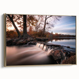 Framed canvas wall art showcasing a vibrant waterfall landscape with lush greenery and golden accents, ideal for enhancing home decor aesthetics.