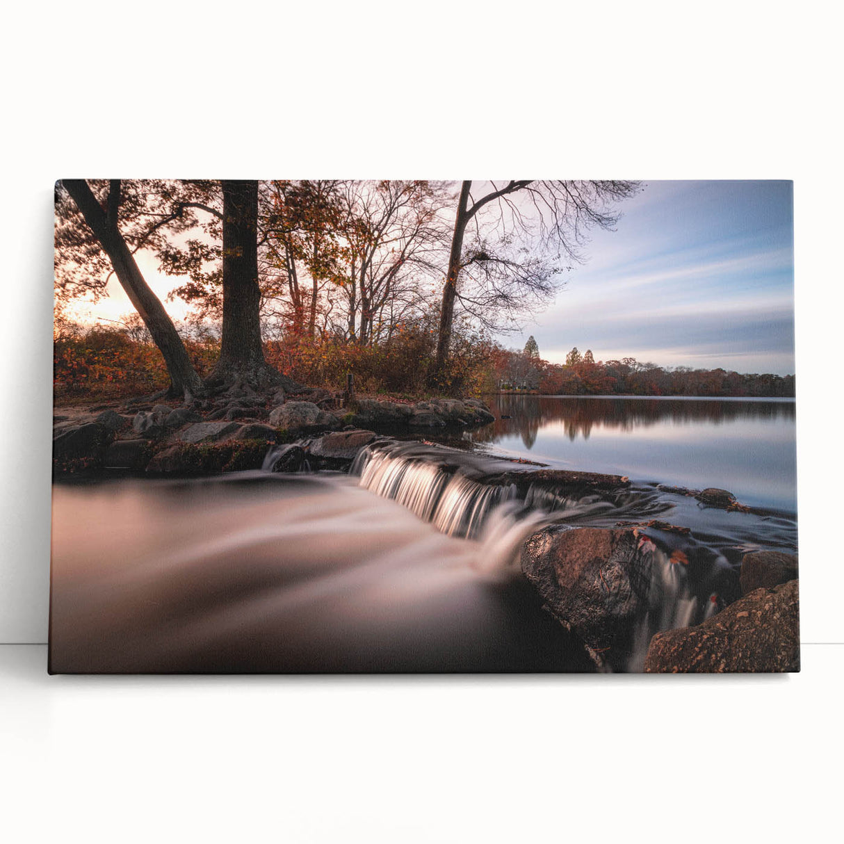 Stretched canvas wall art showcasing a vibrant waterfall landscape in lush greenery, perfect for home decor. Ideal for nature enthusiasts and serene environments.
