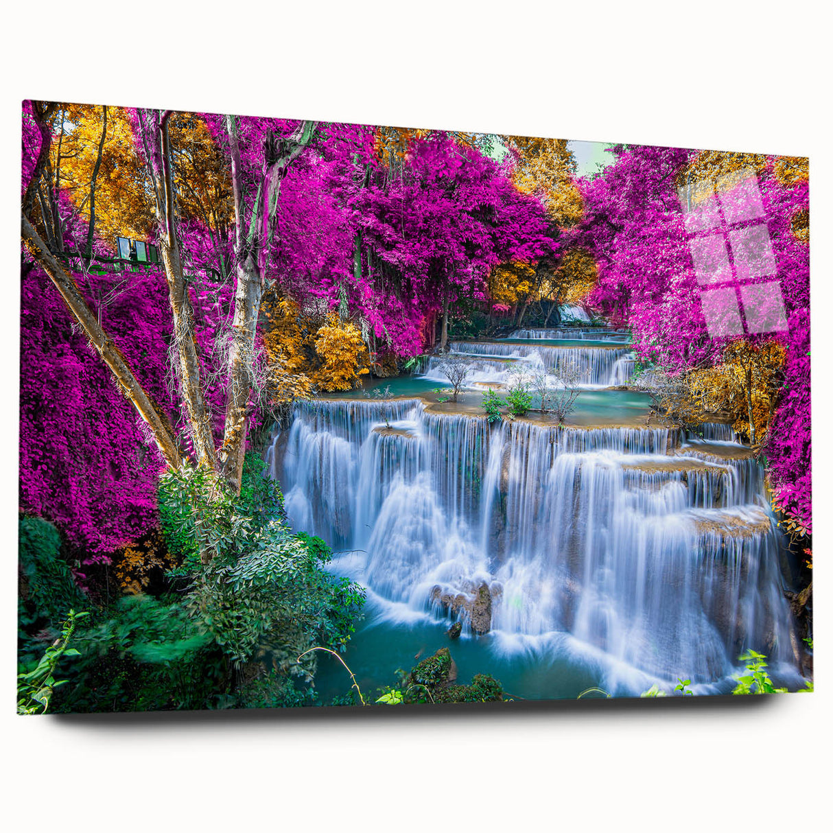 Acrylic wall art featuring a serene waterfall landscape design, showcasing vibrant blues and greens, elegantly displayed in a side view without pins, perfect for home decor.