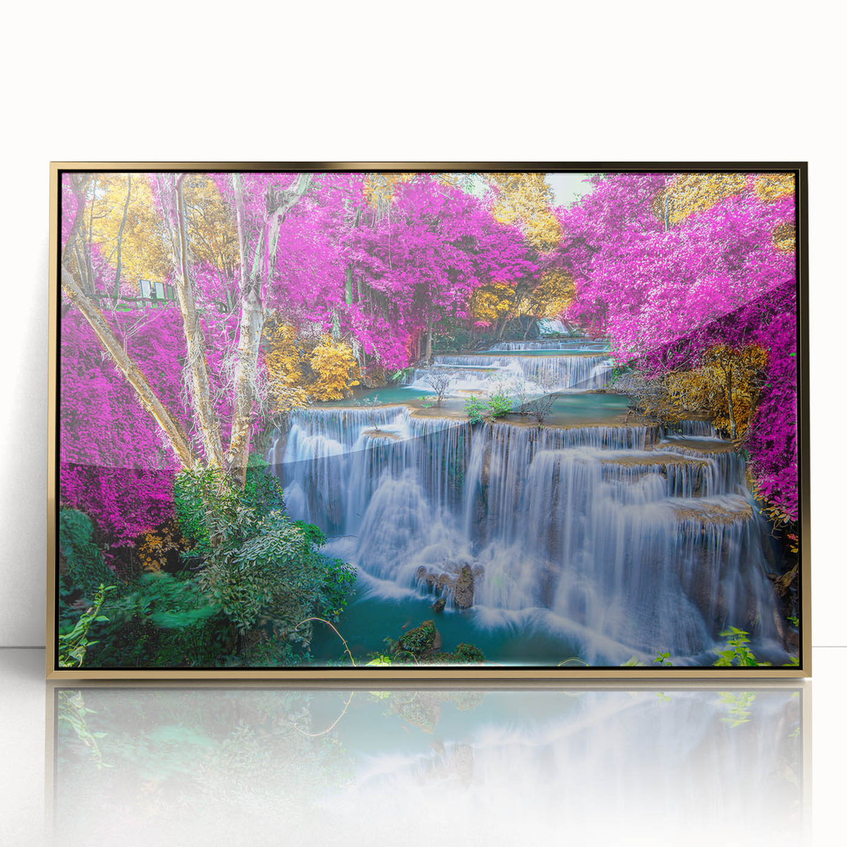 Framed acrylic wall art featuring a stunning waterfall landscape design, accented with a gold frame, perfect for enhancing home decor and creating a serene atmosphere.