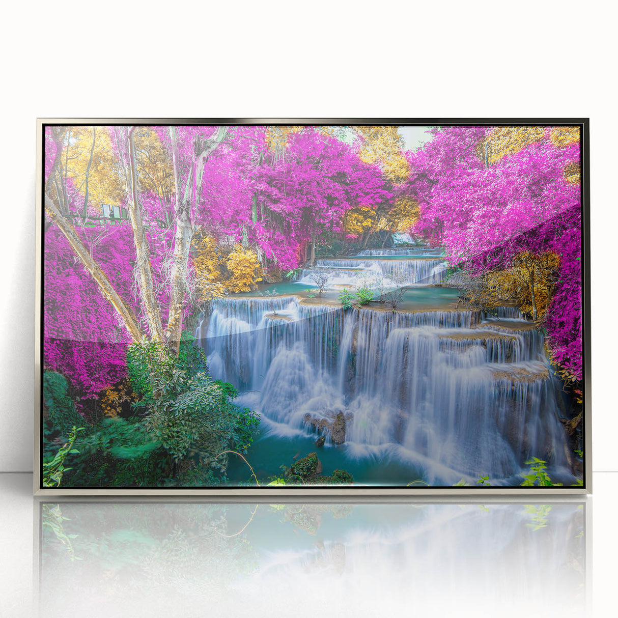 Framed acrylic wall art featuring a serene waterfall landscape in silver tones, perfect for modern home decor. Ideal for enhancing living spaces with nature-inspired elegance.