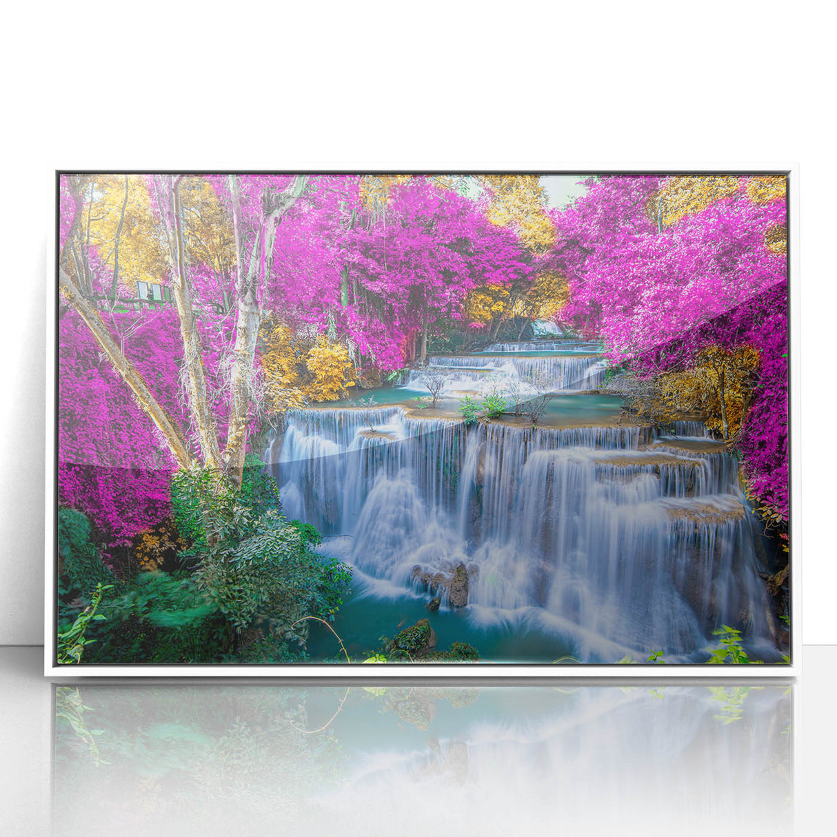 Framed acrylic wall art featuring a serene waterfall landscape design, set in a white frame. Ideal for home decor, this piece adds tranquility to any space.