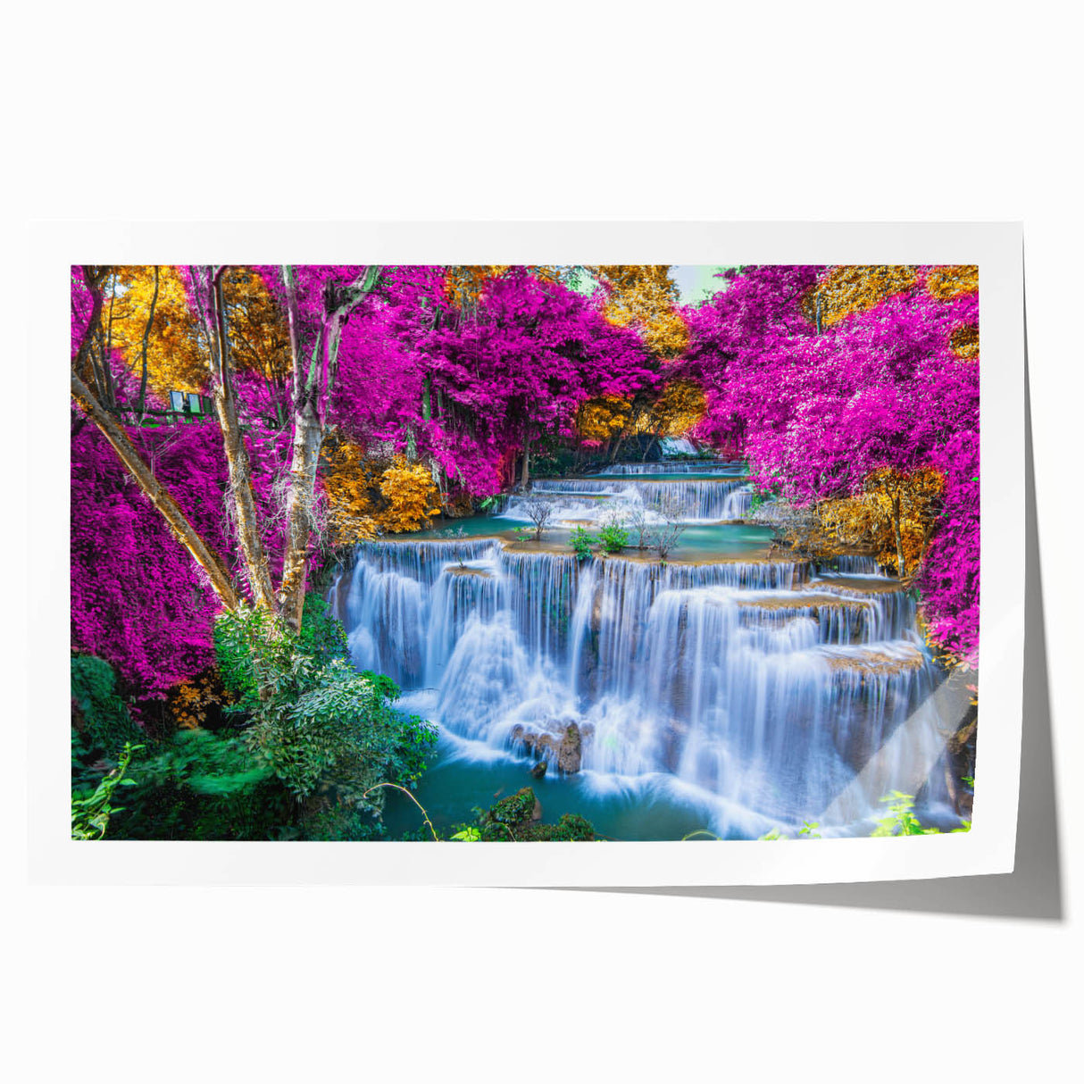 Vibrant rolled print of a cascading waterfall surrounded by lush greenery, ideal for home decor, showcasing natural beauty and tranquility in landscape art.