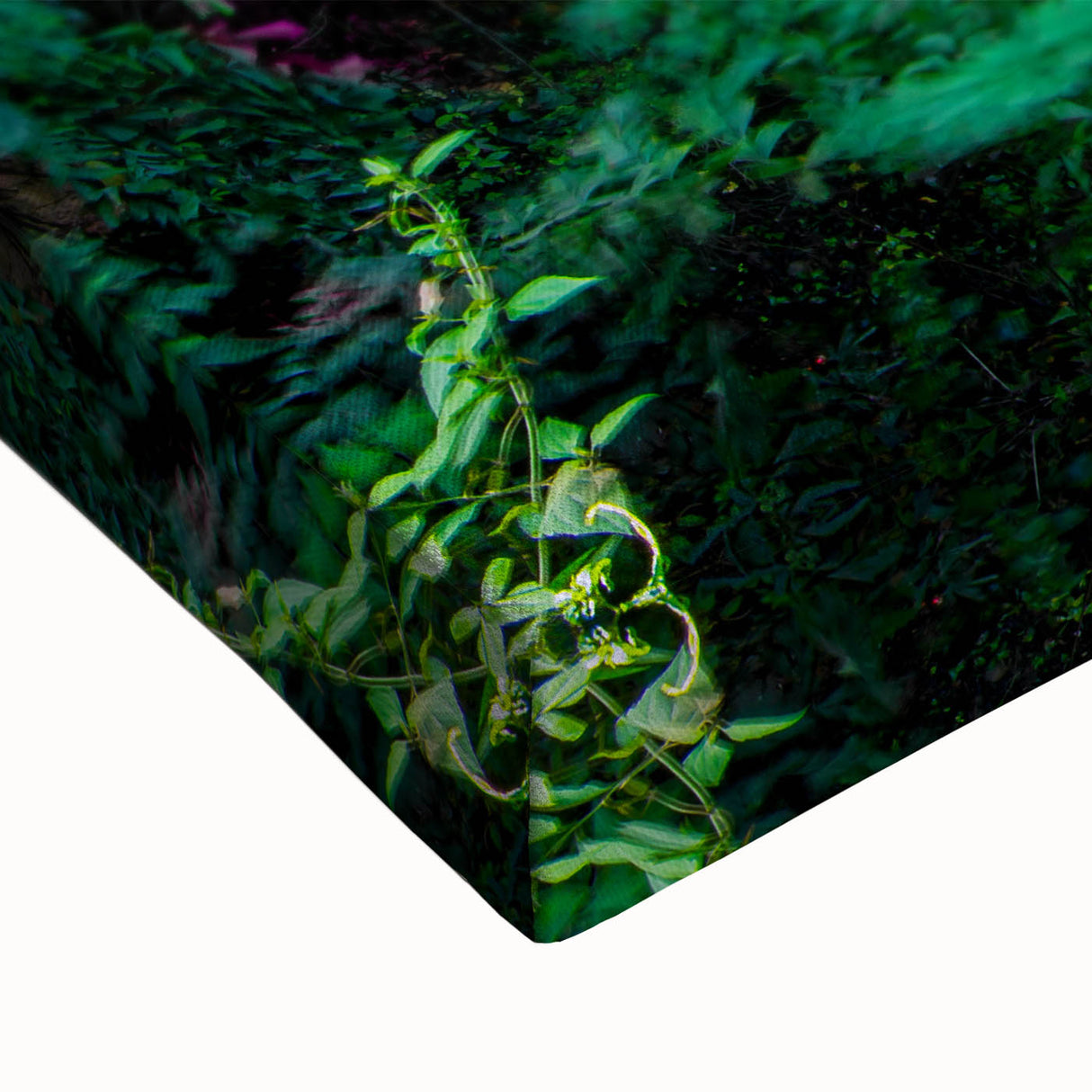 Close-up of a stretched canvas wall art piece showcasing a vibrant waterfall landscape design, featuring lush greenery and cascading water, perfect for home decor.