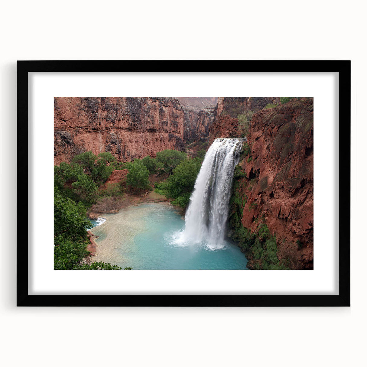 Framed wall art featuring a serene waterfall landscape design, elegantly matted with a black frame, perfect for enhancing home decor and creating a calming atmosphere.