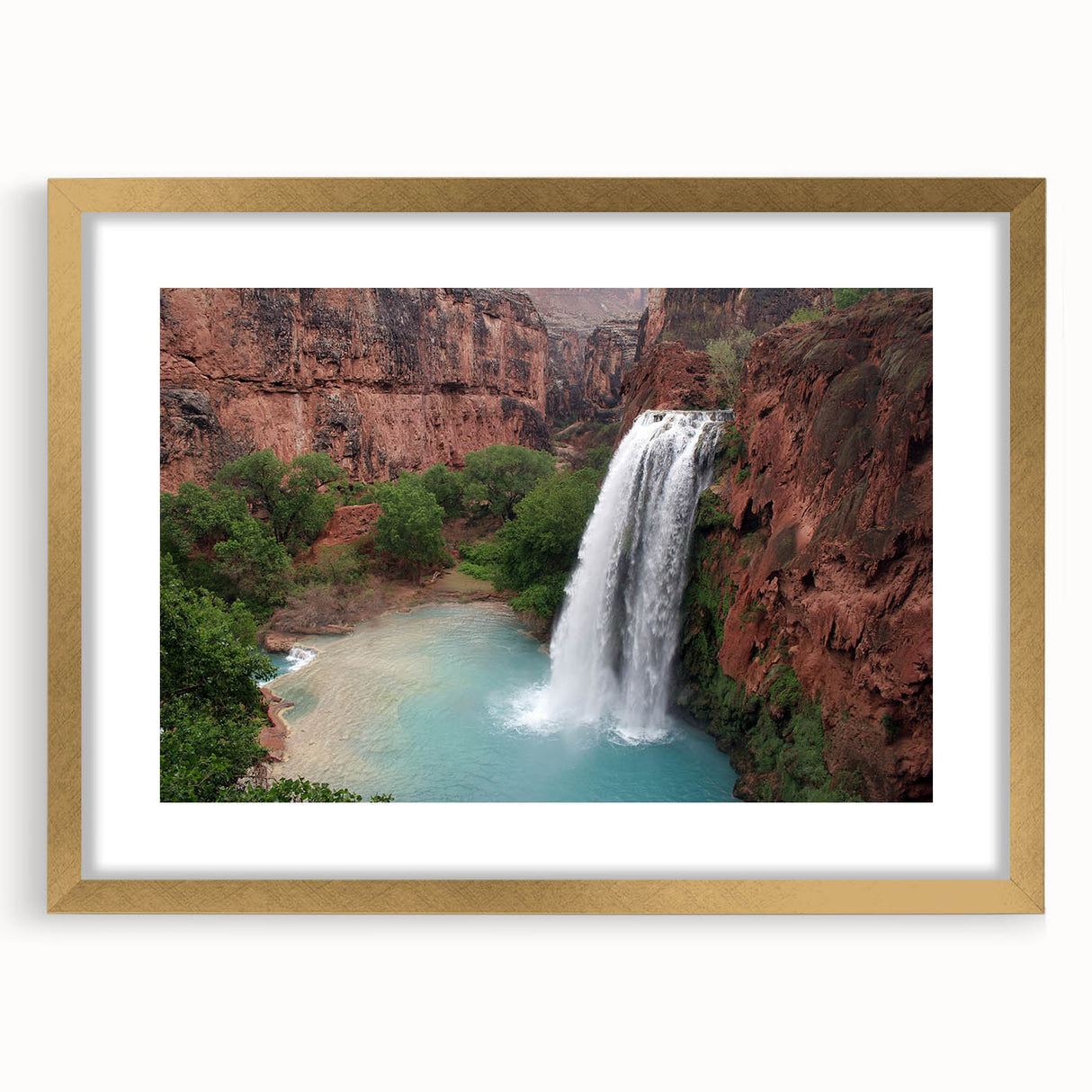 Framed wall art showcasing a vibrant waterfall landscape design with a gold mat, perfect for home decor and enhancing interior aesthetics. Ideal for nature lovers.
