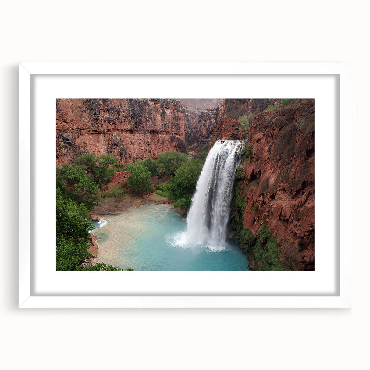 Framed wall art collection showcasing a serene waterfall landscape, featuring vibrant colors and intricate details, set in a white mat for a modern aesthetic. Perfect for enhancing home decor.