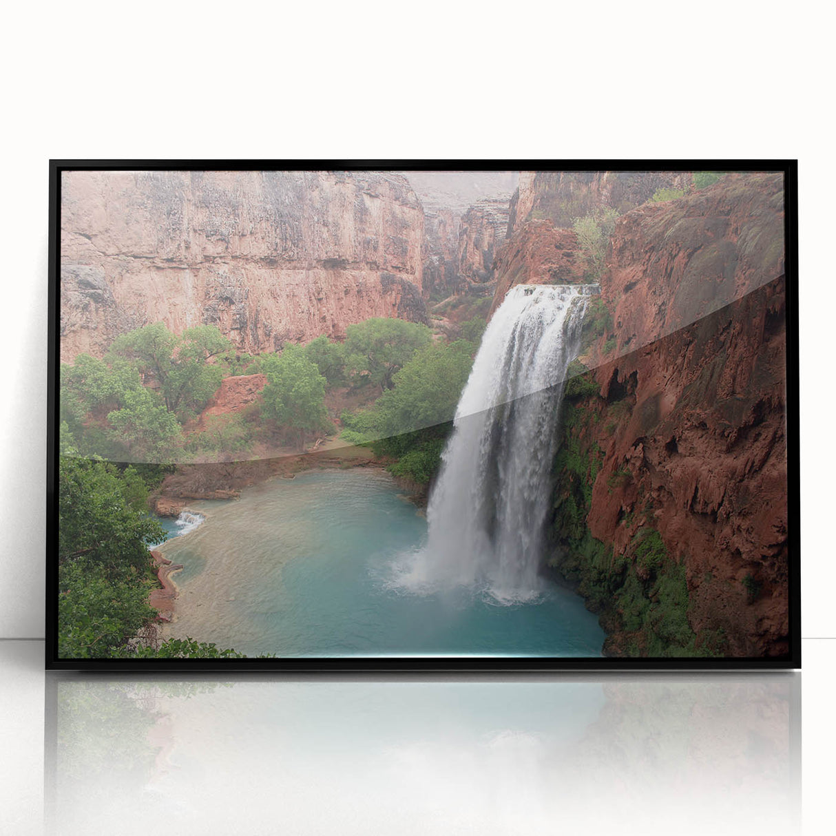 Framed acrylic wall art showcasing a serene waterfall landscape design, featuring vibrant colors and sleek black frame, ideal for home decor enhancement.
