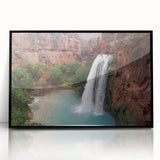 Framed acrylic wall art showcasing a serene waterfall landscape design, featuring vibrant colors and sleek black frame, ideal for home decor enhancement.