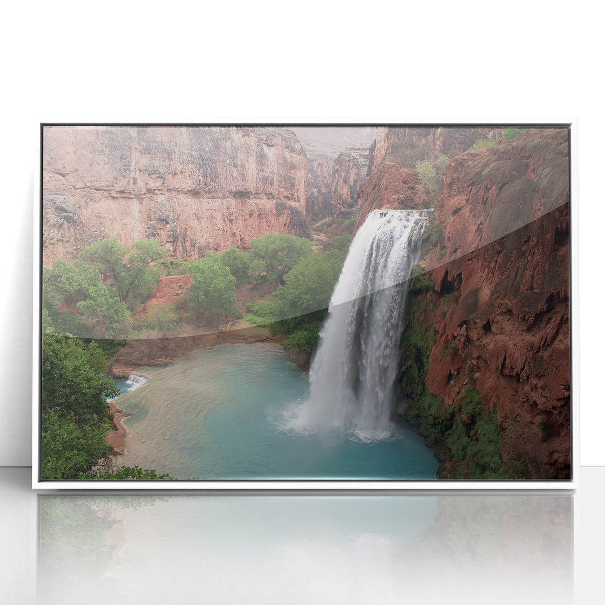 Framed acrylic wall art depicting a serene waterfall landscape with lush greenery, showcasing vibrant colors and intricate details, perfect for home decor.
