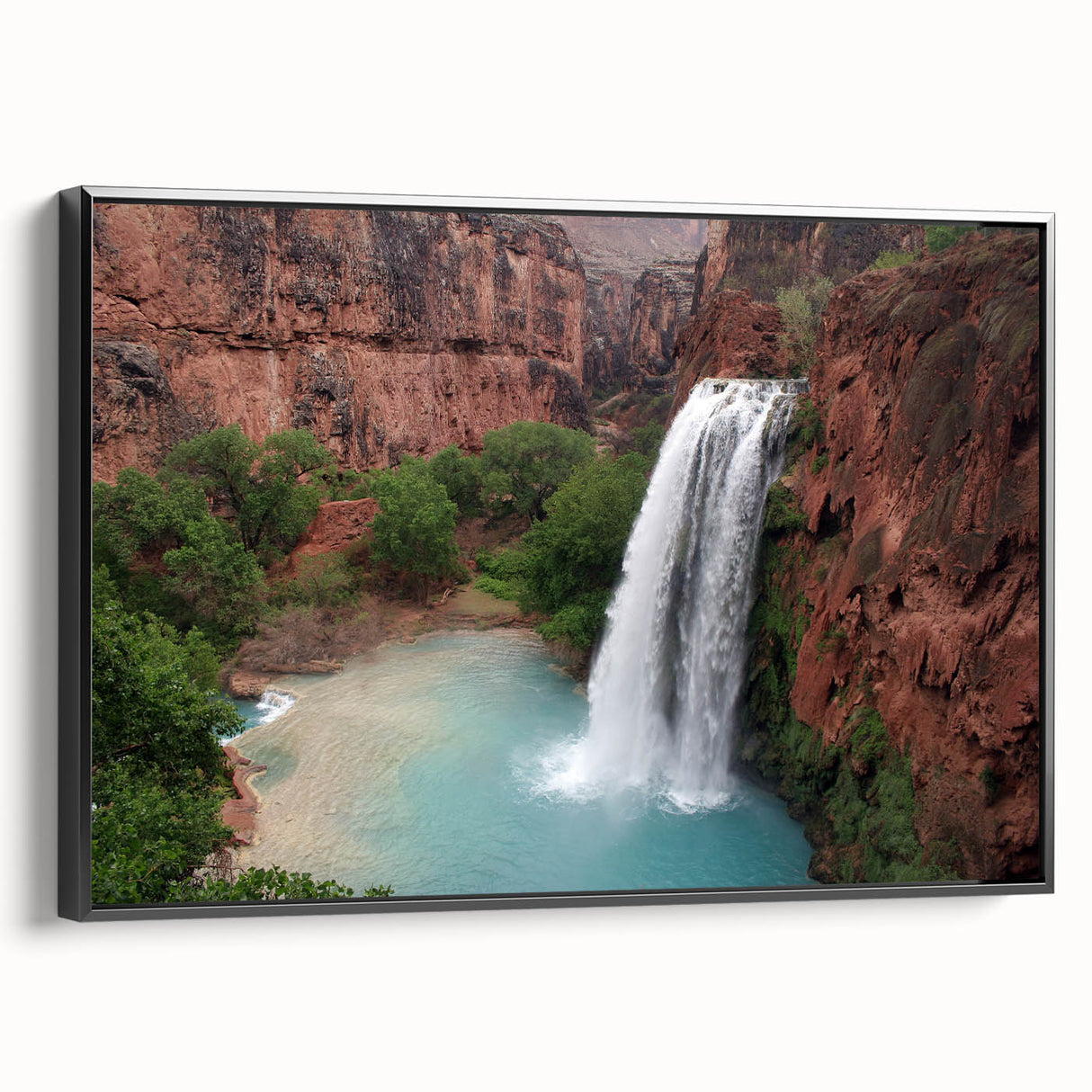 Framed canvas wall art showcasing a stunning waterfall landscape design with vibrant colors and intricate details, set against a sleek black frame, perfect for home decor.