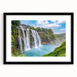 Framed wall art collection showcasing a stunning landscape waterfall design, featuring a sleek black frame and mat, perfect for enhancing any home decor.