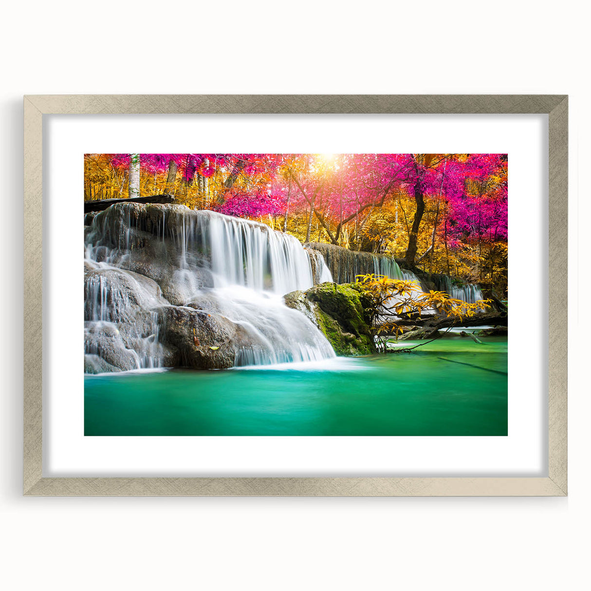 Framed wall art collection showcasing serene landscapes and cascading waterfalls, highlighted by a silver mat and frame, perfect for enhancing home decor.
