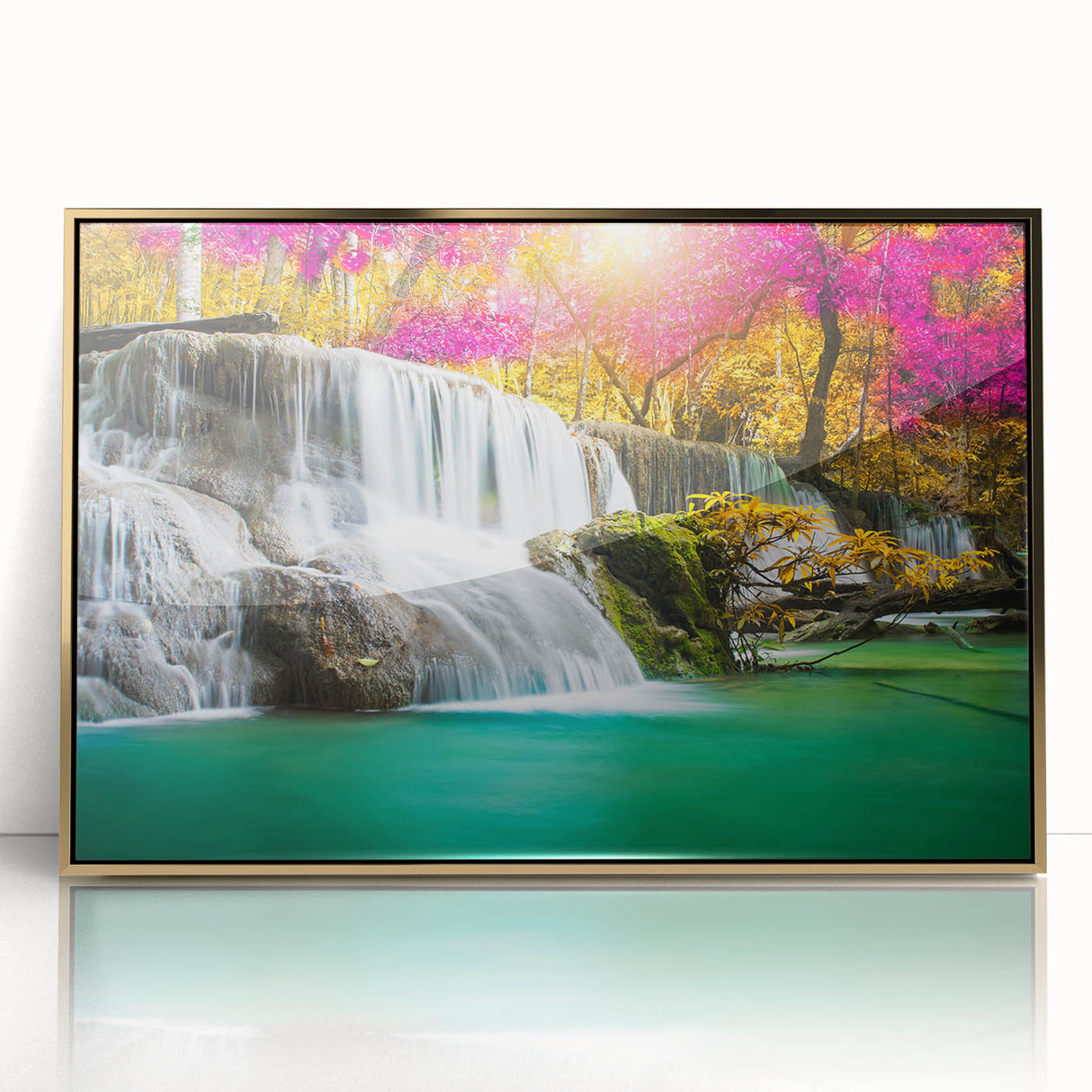 Framed acrylic wall art featuring a stunning landscape waterfall design in vibrant colors, accented with a chic gold frame, perfect for modern home decor.
