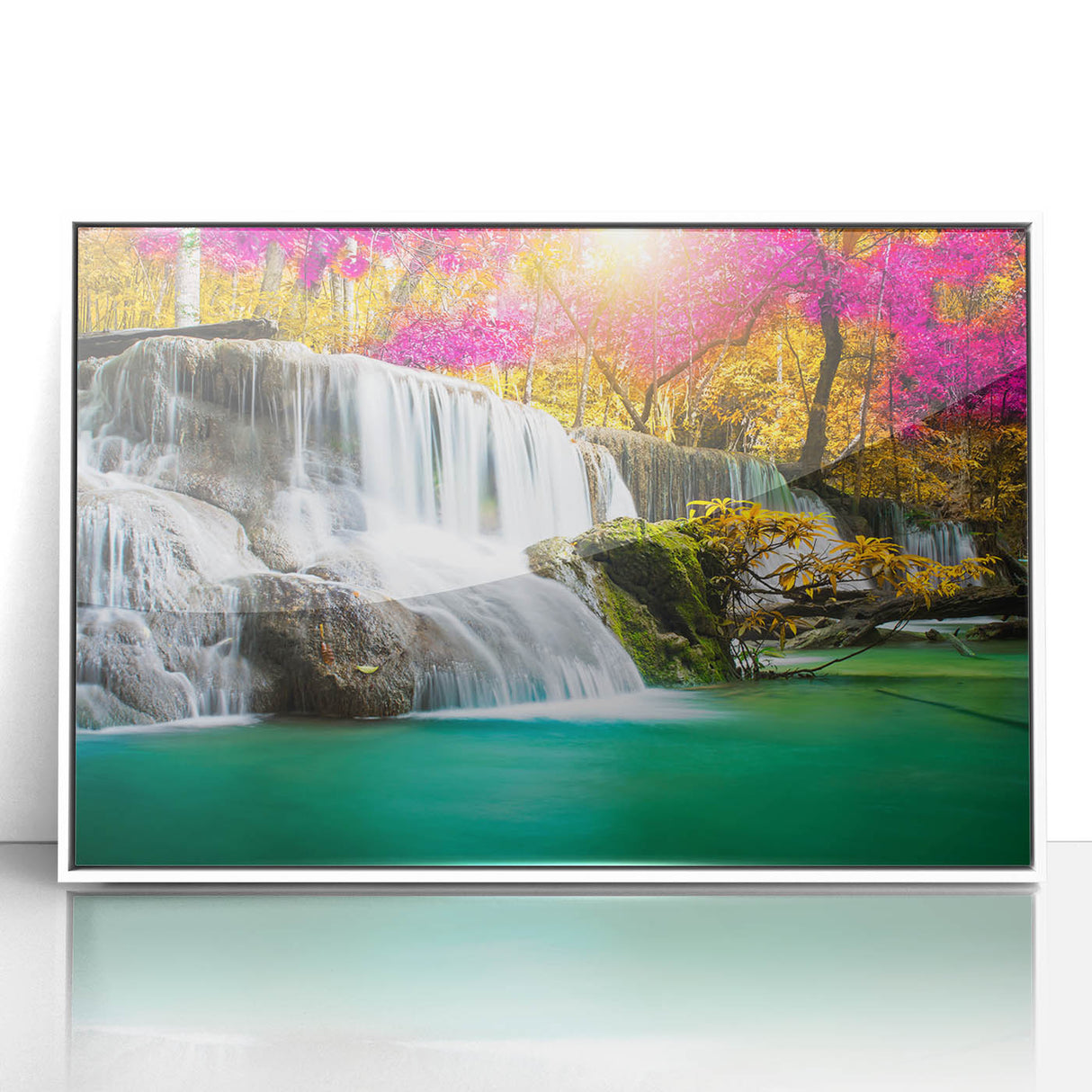 Framed acrylic wall art featuring a vibrant waterfall landscape design, showcasing rich blues and greens, perfect for enhancing any living space.