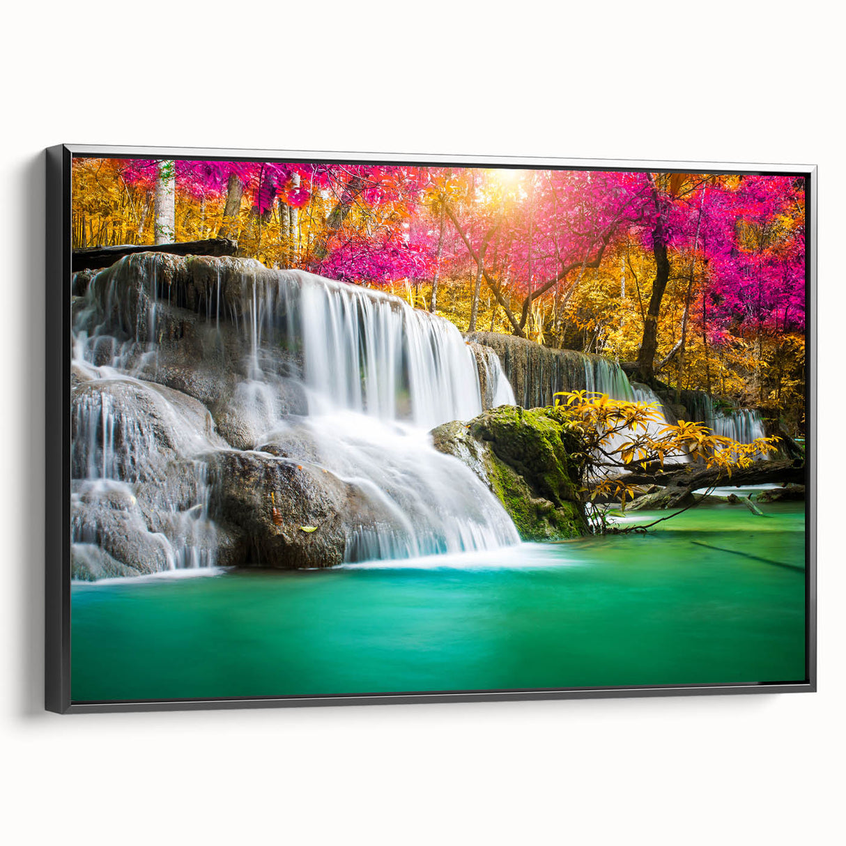 Framed canvas wall art featuring a stunning waterfall landscape design, set in a sleek black frame, showcasing vibrant colors and serene natural beauty.