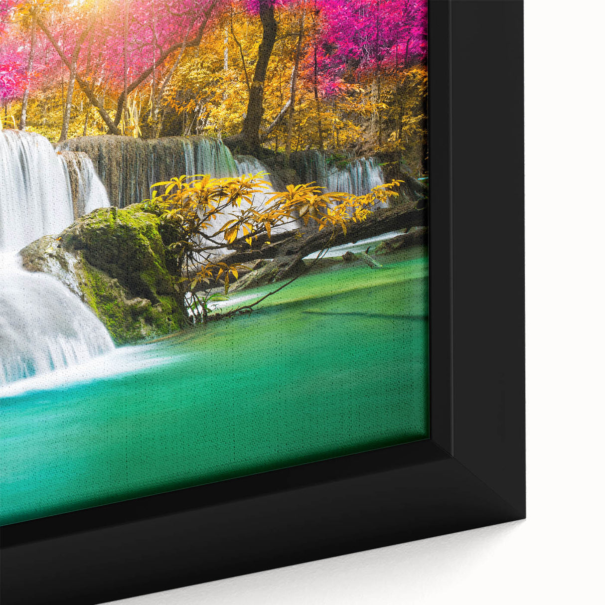 Framed canvas artwork showcasing a vibrant landscape waterfall design with intricate details and rich colors, perfect for enhancing home decor.