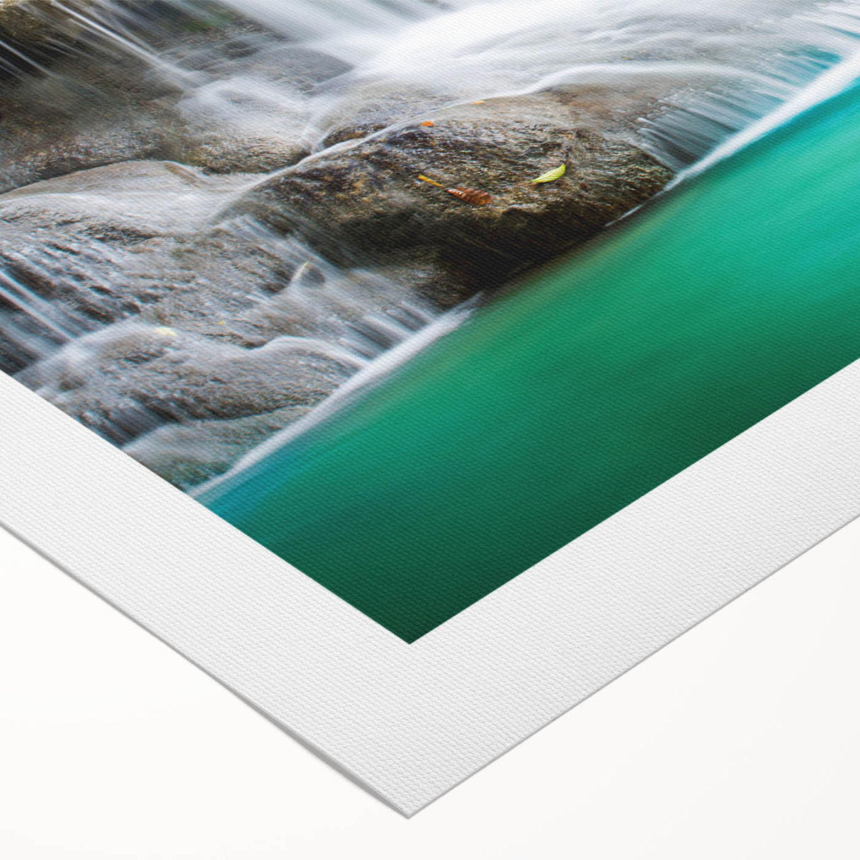 Vibrant rolled canvas wall art depicting a serene waterfall landscape surrounded by lush greenery, perfect for home decor. Features rich colors and detailed textures.