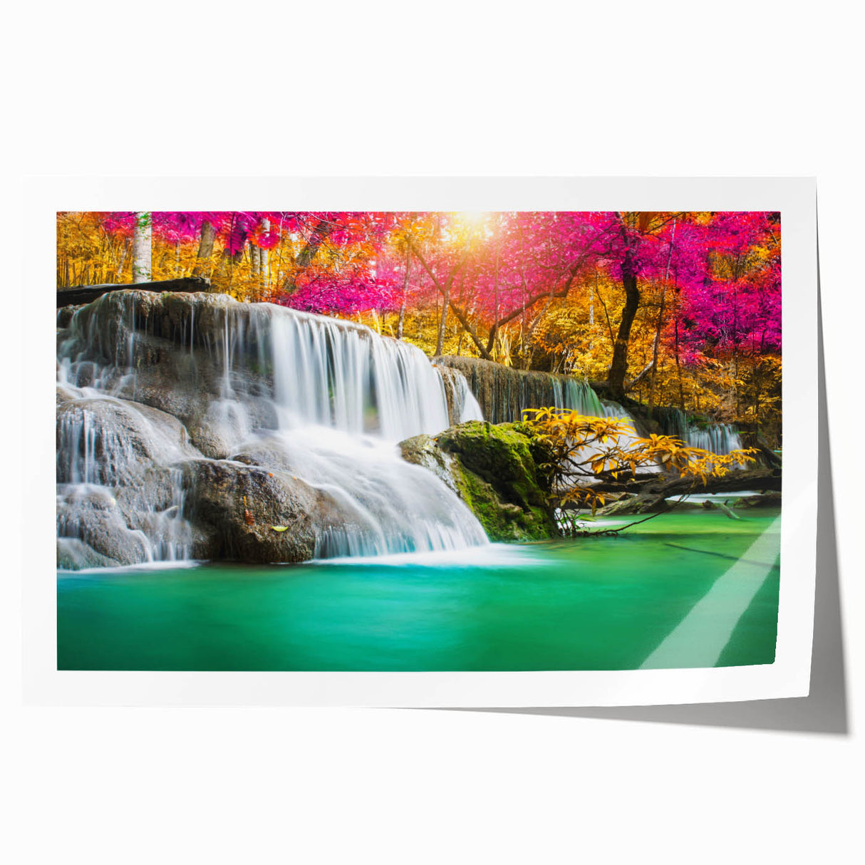 Stunning landscape wall art print showcasing cascading waterfalls surrounded by lush greenery, rolled for easy shipping and display in any decor setting.
