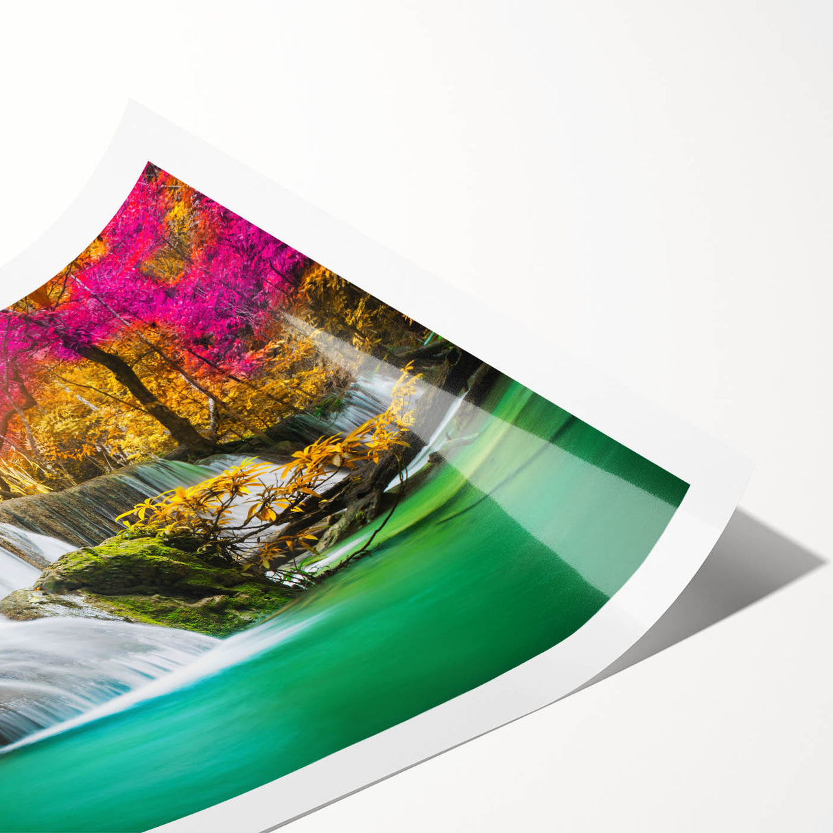 Stunning waterfall landscape wall art print showcasing vibrant blues and greens, rolled and ready for display, perfect for enhancing any living space decor.