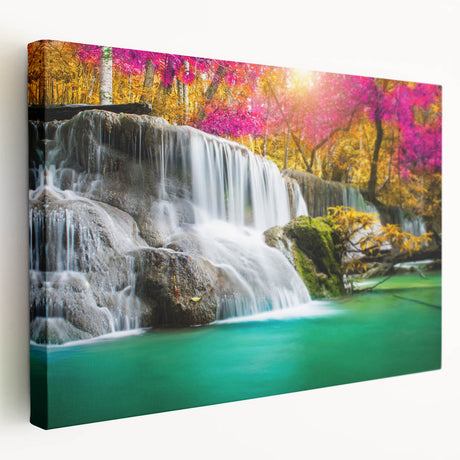 Vibrant stretched canvas wall art depicting a serene waterfall landscape, featuring lush greenery and soft flowing water, perfect for home décor enhancement.