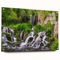 Acrylic glass wall art featuring a serene waterfall landscape design, displayed in a side view with visible mounting pins, perfect for home decor. The vibrant colors and intricate details enhance any space, making it an ideal choice for nature lovers.