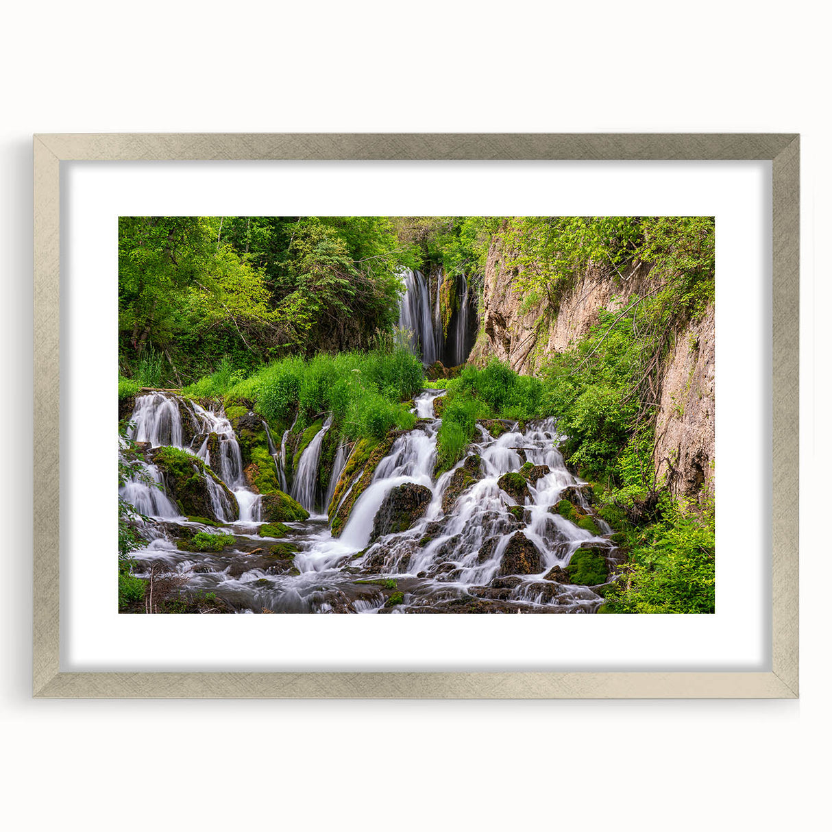 Framed wall art collection showcasing a serene waterfall landscape design with silver matting, perfect for enhancing home decor and creating a tranquil ambiance.