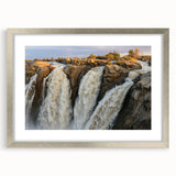 Framed wall art collection showcasing a serene waterfall landscape design with a silver mat, perfect for enhancing home décor and bringing nature indoors.