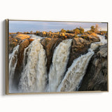 Framed canvas wall art showcasing a serene waterfall landscape design with vibrant colors, accented by a gold frame, ideal for enhancing home decor.