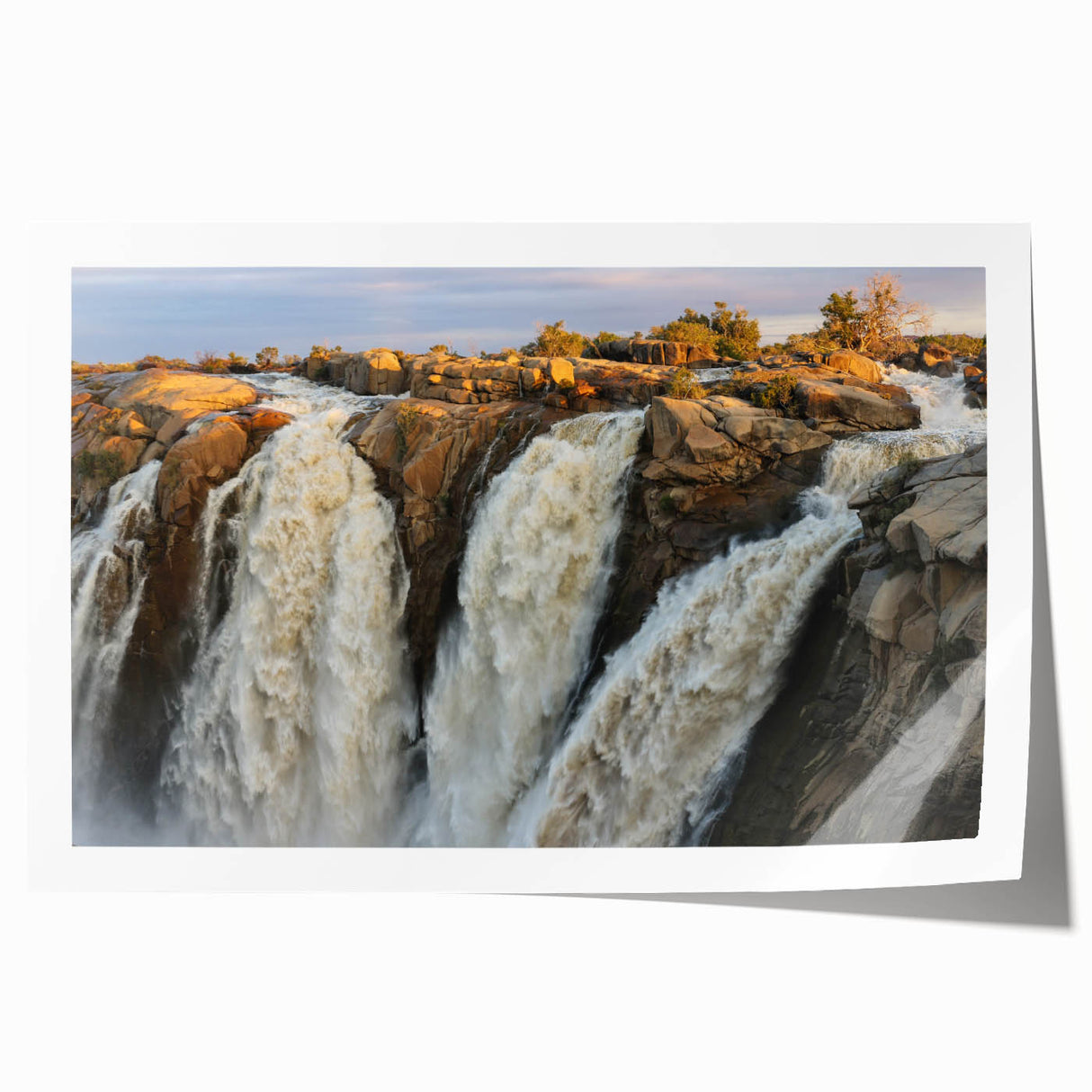 Stunning rolled canvas print of a serene waterfall landscape, showcasing vibrant blues and greens, perfect for enhancing home decor with a natural touch.