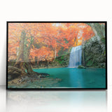 Framed wall art featuring a stunning waterfall landscape design, presented in a sleek black frame, ideal for enhancing modern home decor with natural beauty.
