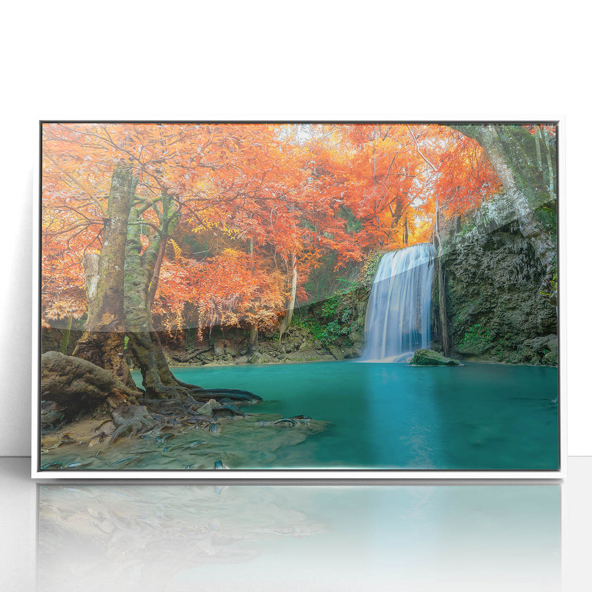 Framed acrylic wall art featuring a serene waterfall landscape in vibrant colors, set in a sleek white frame, enhancing home decor with natural beauty.