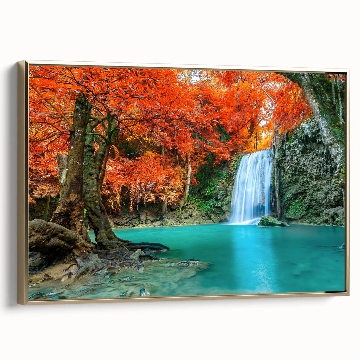 Framed canvas wall art showcasing a serene waterfall landscape design with vibrant blues and greens, accented by a gold frame, ideal for home decor.