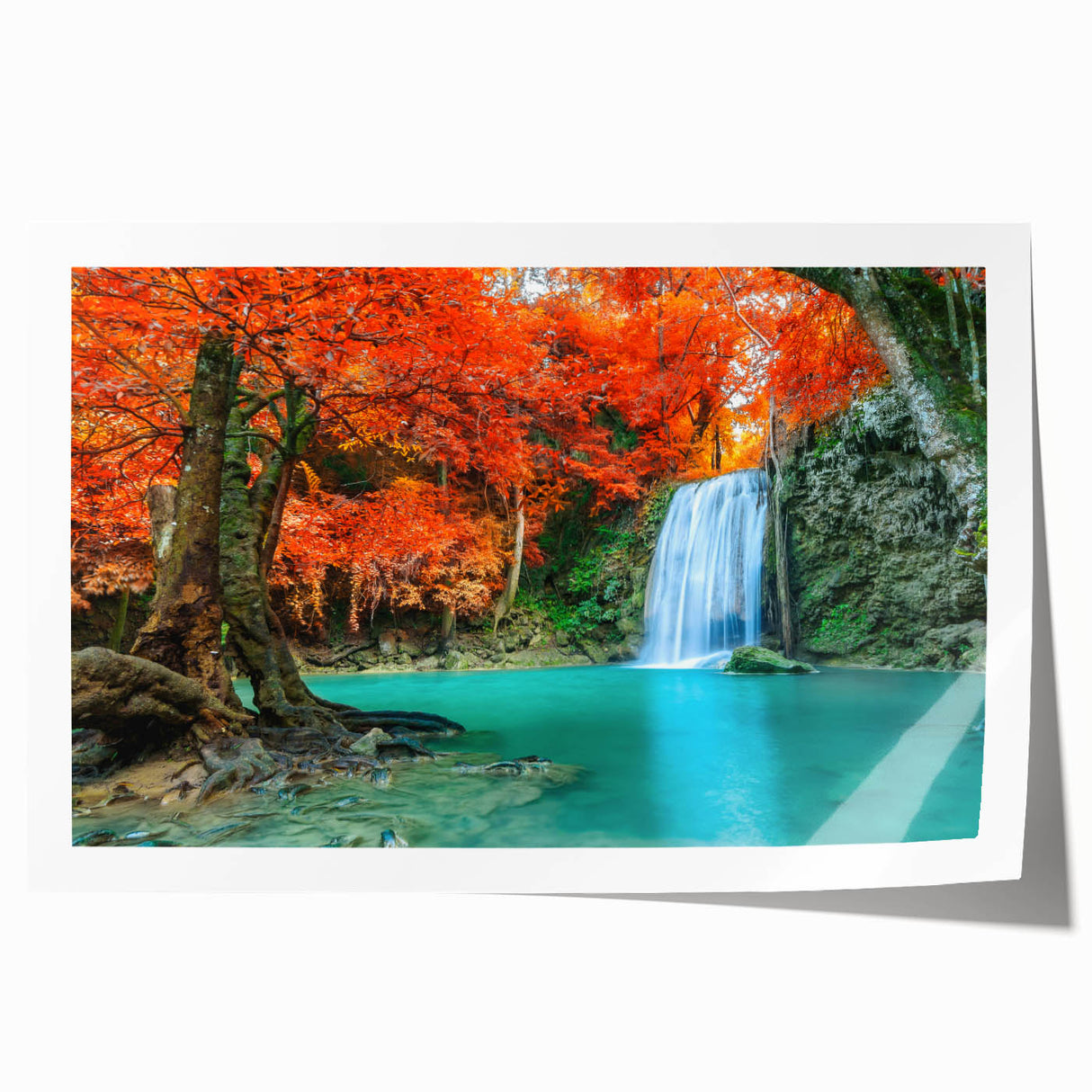 Serene landscape wall art print showcasing a vibrant waterfall cascading over rocky cliffs, framed by lush green foliage, ideal for elevating home decor.