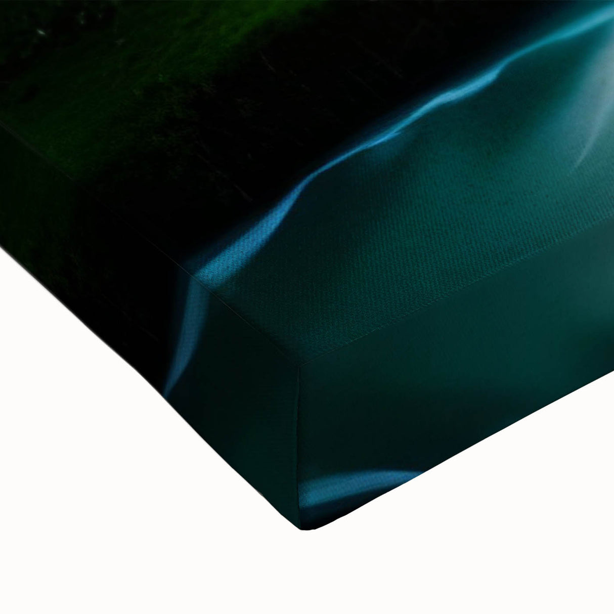 Close-up of a stretched canvas print showcasing a vibrant waterfall landscape with lush greenery and intricate details, ideal for home decor or office art.