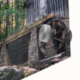 Close-up of a vibrant acrylic glass wall art piece showcasing a serene watermill landscape design, featuring lush greenery and flowing water, ideal for home decor.