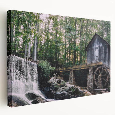 Stretched canvas wall art showcasing a tranquil watermill landscape, featuring vivid greens and blues, ideal for enhancing home decor with natural beauty.
