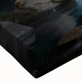 Close-up of a stretched canvas featuring a serene landscape with a watermill, showcasing vibrant colors and intricate details, perfect for home decor.