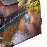 Close-up of a vibrant acrylic wall art piece showcasing a serene watermill landscape, highlighting intricate details and rich colors, perfect for home decor.