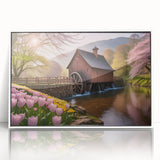 Framed acrylic wall art featuring a serene landscape with a watermill, set against a white background, perfect for enhancing home decor with nature-inspired elegance.