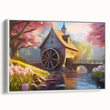 Framed canvas wall art showcasing a serene watermill landscape design, with soft blue and green hues, displayed from a side view against a white backdrop.